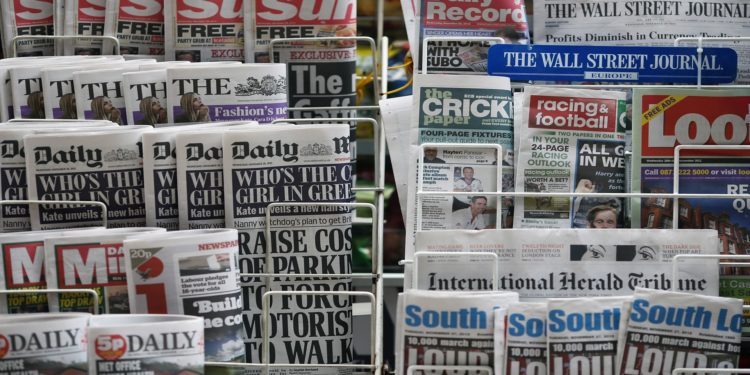 LONDON, ENGLAND - NOVEMBER 28:  Newspapers are displayed on a stand outside a newsagent on November 28, 2012 in London, England. The findings of the Leveson Inquiry which focused on the culture, practices and ethics of the press, is due to be published tomorrow by Lord Justice Leveson after an 18 month inquiry.  (Photo by Dan Kitwood/Getty Images)