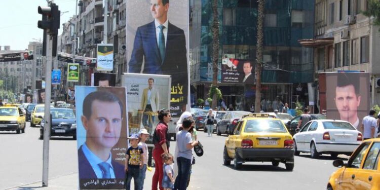 صور الرئيس السوري في العاصمة دمشق