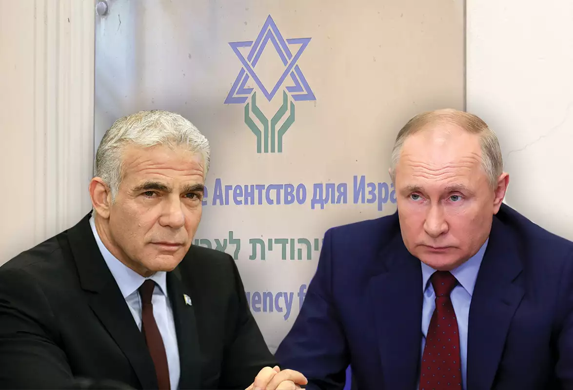 الرئيس الروسي فلاديمير بوتين ورئيس الحكومة الإسرائيلية يائير لابيد (وكالات)