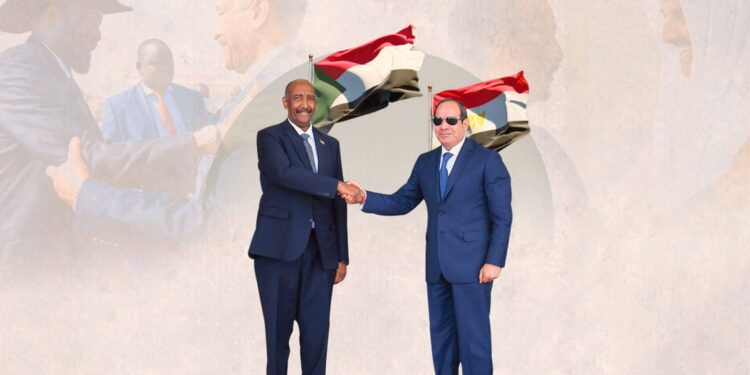الرئيس السيسى يصافح قائد الجيش السودانى