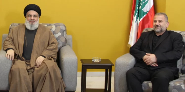 الأمين العام لحزب الله حسن نصر الله والقيادي في حماس صالح العاروري